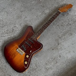 This Healer is for our friend Steve M. Who’s been a repair client for a long time and most recently a business advisor here. When we started up this commission I really loved how he basically had the whole idea for it ready to go. A burst that never goes fully opaque, roasted woods, natural head cap, Tele bridge pickup paired with 2 Strat pickups and a push/pull pot to engage the neck and bridge. Chopped tele bridge, string through the body, combine the things he loves about a Strat and a Tele. Tortoise guard, neck shaped like his favorite guitar. Done. 

What else is there? Chambered Alder body, roasted maple neck with mineral stains that we love, quarter sawn roasted maple head cap, Indian rosewood fretboard, 95x47 fret wire, bone nut, Kluson Deluxe Safe-T Post tuners, 11-49 D’Addario Strings, VIP 280k pots, Forney electrosocket, Lollar pickups. 24 screws or so. Nitrocellulose lacquer. I’ve been doing this thing on the back of the neck which is fun too. You spray 3-4 coats of 60/40 Nitro/Thinner as a sealer, sand it level with a 320-400 grit pad and then apply 1-3 coats of TrueOil as needed. You want very little oil on the pad/towel, it’s more like a French polish style thing. Give it a go!

Thanks Steve! #healyguitars #healyhealer #offsetguitars #lollarpickups